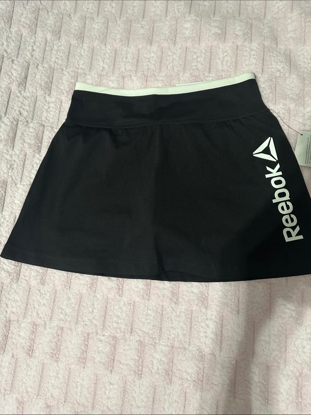 Reebok Black Skort with White Reebok Logo girls  medium (7-8)